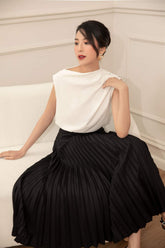 Sleeveless pleated silk top with asymmetric draped neckline and button shoulder detail